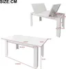 A diagram showing the dimensions of a white table, with two views: one showing the table fully assembled and another showing it partially extended with storage compartments. Anteprima dell’immagine prodotto