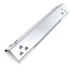A shiny, metallic grill accessory with flame cutouts. Produktbild-Vorschau