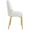 A side view of a cream-colored velvet chair with gold metal legs. Náhľad obrázku produktu