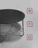 Close-up of a round coffee table with a fabric storage basket underneath, showing its design and materials. Icons on the right suggest features. Náhled obrázku produktu