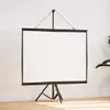 A white projection screen with a black frame and tripod stand is shown against a white wall and wooden floor. Produktbild-Vorschau