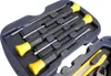 A close-up view of a tool kit case containing screwdrivers and a utility knife. Produktbild-Vorschau