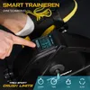 A close-up of a person's foot on a mini exercise bike, with a digital display showing workout data. Produktbild-Vorschau