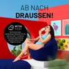 A woman in a bikini sits on a navy blue beanbag chair, eating an ice cream, with colorful artwork in the background. Produktbild-Vorschau