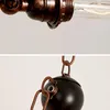 Close-up shots of a vintage-style light fixture, showing the bulb socket and a decorative element. Produktbild-Vorschau