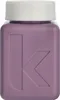 A close-up studio shot of a small, square, purple bottle with a white cap. Produktbild-Vorschau