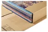 A stack of vinyl records in a cardboard shipping box. Anteprima dell’immagine prodotto