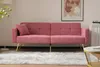 A pink sofa with gold legs is shown in a living room setting. Produktbild-Vorschau
