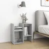 A bedroom setting with a nightstand and a bed. Voir les images du produit