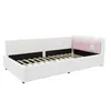 A white upholstered daybed with a pink scalloped headboard and a small white decorative element. Náhľad obrázku produktu