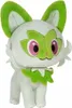 A plush toy of a cat-like creature with green accents. Produktbild-Vorschau