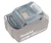 A close-up studio shot of a gray Makita battery with a clear plastic protective cover. Produktbild-Vorschau
