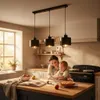 A mother and child are baking in a kitchen, with a pendant light fixture hanging above. Náhled obrázku produktu