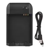 A black battery charger and a black USB cable are shown on a white background. Produktbild-Vorschau