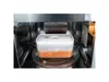 A food container with food inside is placed in a microwave. Produktbild-Vorschau