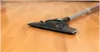 A vacuum cleaner head on a wooden floor. Voir les images du produit