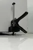 A close-up view of a furniture lifter attached to a white surface. Náhled obrázku produktu