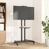 A TV stand on wheels is shown in a room with a bookshelf and a plant. Podgląd zdjęcia produktu