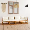 An outdoor seating area with a wooden sofa and cushions, a window, and a macrame wall hanging. Produktbild-Vorschau