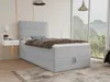 A bed with a headboard and mattress in a room with a large window overlooking mountains. Produktbild-Vorschau