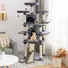 Three cats are playing on a multi-level cat tree in a living room setting. Náhľad obrázku produktu