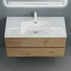 A wall-mounted bathroom vanity with a sink and faucet, set against a gray wall. Produktbild-Vorschau