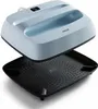 A light blue Cricut Easy Press 3 heat press is shown lifted above its black base, which has a perforated surface. Produktbild-Vorschau