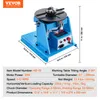 A blue welding positioner with a turntable and chuck, shown with dimensions and specifications. Podgląd zdjęcia produktu