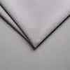 A close-up shot of a folded grey fabric, likely a textile sample or a detail of a larger product. Produktbild-Vorschau
