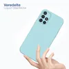 A hand holding a light blue phone case against a white background. Produktbild-Vorschau