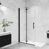 A modern bathroom with a black-framed glass shower enclosure. Produktbild-Vorschau