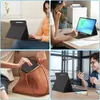 Collage of four images showing a tablet with a keyboard case in different settings and uses. Anteprima dell’immagine prodotto