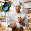 A chef in a kitchen holding peanut butter products. Produktbild-Vorschau
