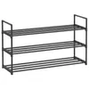 A black, three-tiered shoe rack is shown against a white background. Anteprima dell’immagine prodotto