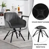 A dark gray velvet swivel chair with metal legs is shown in a room setting, with close-up views of its turntable and metal frame. Produktbild-Vorschau