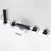 A black bathtub faucet set with multiple components and dimensions indicated by measurement lines and text. Produktbild-Vorschau
