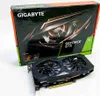 A Gigabyte GeForce GTX 1660 SUPER graphics card and its packaging are displayed against a white background. Podgląd zdjęcia produktu