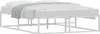 A white metal bed frame with a mattress and a grey blanket. Produktbild-Vorschau