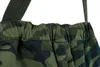 A close-up view of the waistband and straps of camouflage work overalls. Náhled obrázku produktu