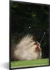 MuchoWow® Gerahmtes Poster Ein männlicher Golfer schlägt Produktbild-Vorschau 1