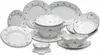 A collection of white porcelain tableware with a blue floral pattern, arranged on a white background. Podgląd zdjęcia produktu