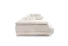A beige sectional sofa is shown from the side against a white background. Podgląd zdjęcia produktu