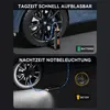 Two images showing a portable tire inflator connected to a car tire. The top image shows it in daylight, and the bottom image shows it at night with its LED light on. Produktbild-Vorschau