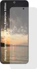 A screen protector is placed over a smartphone displaying a sunset over water. Náhled obrázku produktu