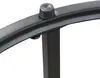 A close-up view of a black metal table leg and a curved edge with a rubber stopper. Produktbild-Vorschau