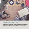 A flat lay of vintage and modern items on a wooden table, with text overlay. Produktbild-Vorschau