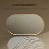 An oval mirror with a gold frame, showing water droplets on its surface, and its reflection in water below. Náhled obrázku produktu