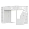 A white loft bed with a wardrobe and shelves on the left, and stairs with drawers on the right. Anteprima dell’immagine prodotto