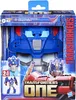 The image shows the packaging for a Transformers One 2-in-1 Maske Optimus Prime and Action Figure toy. The packaging features a large image of Optimus Prime's mask and a smaller image of the action figure. Anteprima dell’immagine prodotto