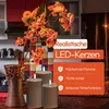 A kitchen counter with a vase of flowers and three LED candles. Anteprima dell’immagine prodotto